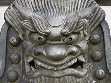 Iron face statue at Tenryuji Temple on Shutterstock.com Iron face statue at Tenryuji Temple on Shutterstock.com