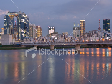 Osaka river at dusk on Shutterstock.com